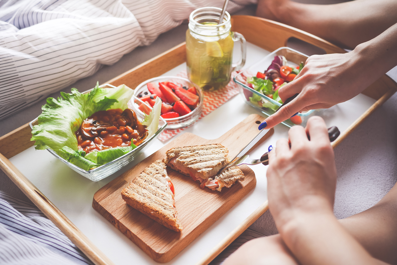 Young woman enjoying breakfast